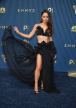 Aimee Carrero walks the red carpet at the 78th Emmy Awards telecast