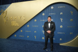 Cris Abrego walks the red carpet at the 78th Emmy Awards telecast