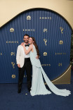 Thomas Doherty and Nicole Brydon Bloom walk the red carpet at the 78th Emmy Awards telecast