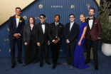 The team from The Daily Show walks the red carpet at the 78th Emmy Awards telecast
