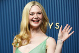 Elle Fanning walks the red carpet at the 78th Emmy Awards telecast