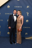 Jimmy Kimmel and Molly McNearney walk the red carpet at the 78th Emmy Awards telecast