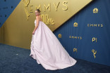 Emilia Clarke walks the red carpet at the 78th Emmy Awards telecast