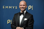 Sean Evans walks the red carpet at the 78th Emmy Awards telecast