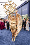Megan Stalter walks the red carpet at the 78th Emmy Awards telecast