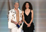 Alan Cumming and Emmy Rossum speak on stage during the 78th Emmy Awards telecast