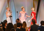 Julia Garner and Florence Pugh present the Emmy for Outstanding Lead Actress in a Drama Series to Rhea Seehorn for Pluribus during the 78th Emmy Awards telecast