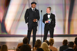 LL Cool J and Scott Caan speak on stage during the 78th Emmy Awards telecast