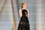 Katie Dippold accepts the Emmy for Outstanding Writing for a Comedy Series for Widow's Bay during the 78th Emmy Awards telecast