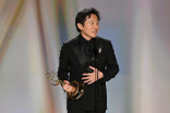 Hiro Murai accepts the Emmy for Outstanding Directing for a Comedy Series for Widow's Bay during the 78th Emmy Awards telecast