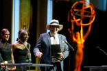 Andres Pruna accepts his award at the 67th Los Angeles Area Emmy Awards July 25, 2015, at the Skirball Cultural Center in Los Angeles, California.