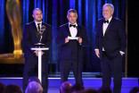 Eduardo Guisandes, Efrain Montanez and Jerry Torgerson accept an award at the 2021 Creative Arts Emmys.