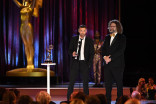Stephane Rituit and Sebastian Sylwan accept an award at the 2021 Creative Arts Emmys.