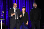Louie Zakarian, Amy Tagliamonti, and Jason Milani accept an award at 2021 Creative Arts Emmys.