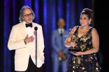 Melissa Shakun and Keith Raywood accept an award at the 2021 Creative Arts Emmys.