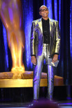 RuPaul Charles presents an award at the 2021 Creative Arts Emmys.