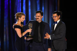 Vickie Curtis, Davis Coombe, and Jeff Orlowski accept an award at the 2021 Creative Arts Emmys.