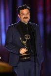 Davis Coombe accepts the award at the 2021 Creative Arts Emmys. 