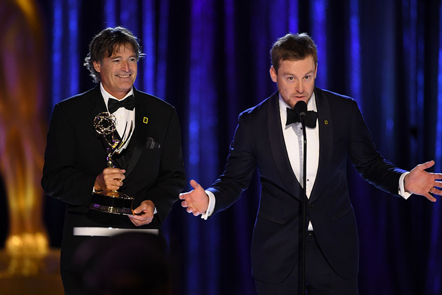 Tom Day and Michael Cheeseman accept an award at the 2021 Creative Arts Emmys.