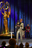 RuPaul accepts an Emmy at the 2021 Creative Arts Emmys.