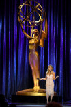 Chrishell Stause presents an award at the 2021 Creative Arts Emmys.