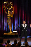 Derek Hough accepts an award at the 2021 Creative Arts Emmys.