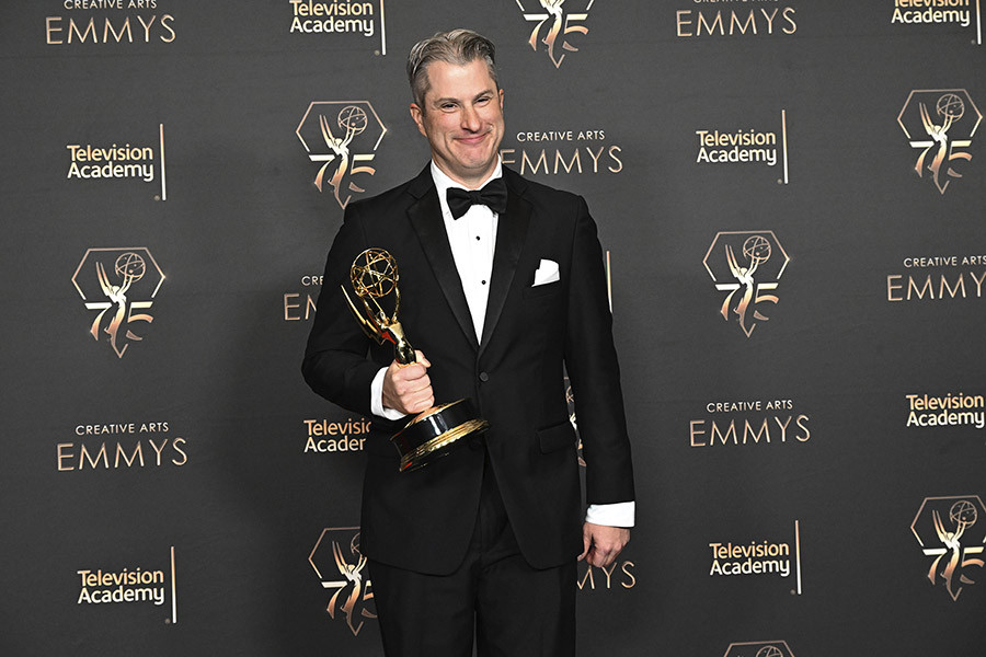 Chris Poulos backstage at the 75th Creative Arts Emmy Awards