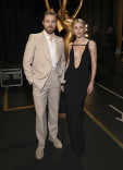 Derek Hough and Julianne Hough from Dancing With the Stars backstage at the 75th Creative Arts Emmy Awards