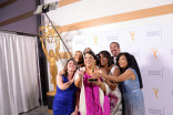 The CBS2-KCAL9 news team commemorate their evening at the 67th Los Angeles Area Emmy Awards July 25, 2015, at the Skirball Cultural Center in Los Angeles, California.