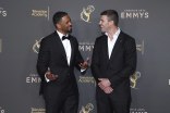 Damon Wayans Jr. and Austin Stowell pose backstage at the 76th Creative Arts Emmy Awards