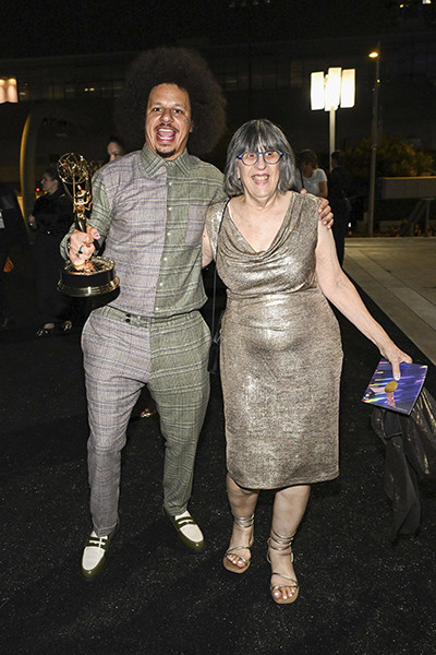 Eric André, award winner for Outstanding Performer in a Short Form Comedy or Drama Series for The Eric Andre Show, arrives with his mother, Natalie André, at the 76th Creative Arts Emmy Awards Governors Gala