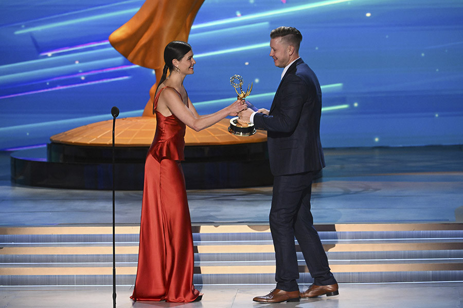 Phillipa Soo presents the award for Outstanding Music Supervision of Fallout to Trygge Toven at the 76th Creative Arts Emmy Awards