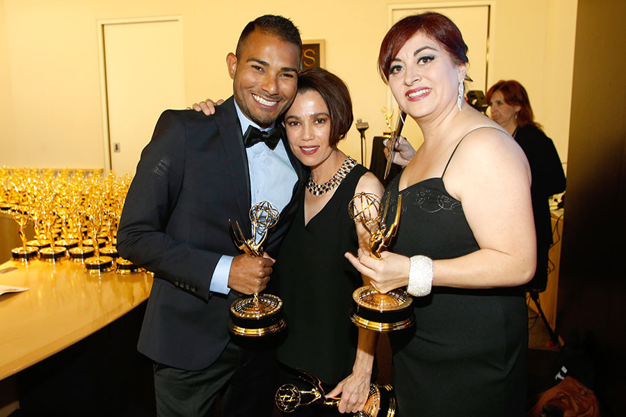 Members of the NBC News 4 team celebrate backstage at the 66th Los Angeles Area Emmy Awards.