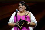 Nicolette Medina accepts an award at the 67th Los Angeles Area Emmy Awards July 25, 2015, at the Skirball Cultural Center in Los Angeles, California.