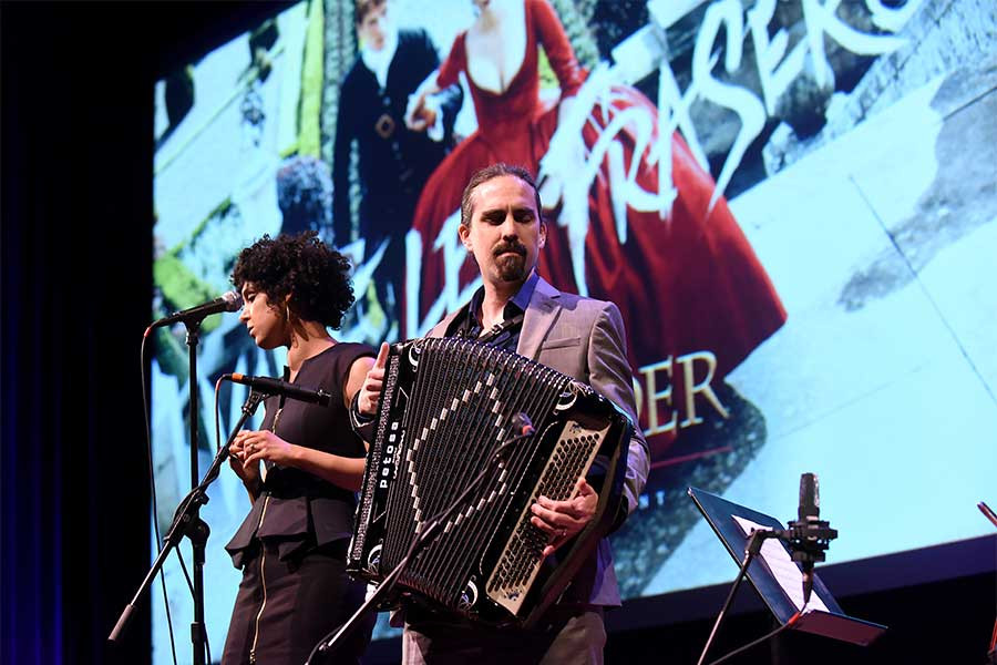 Singer Raya Yarbrough and composer Bear McCreary perform at the Outlander: From Scotland to Paris event, April 5, 2016, at the NYU Skirball Center for the Performing Arts in New York City. 