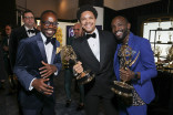 Trevor Noah and the team of The Daily Show With Trevor Noah backstage at the 75th Emmy Awards