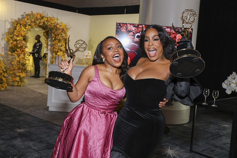 Quinta Brunson of Abbott Elementary and Niecy Nash-Betts of Dahmer - Monster: The Jeffrey Dahmer Story backstage at the 75th Emmy Awards