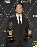 Steven Yeun backstage with his award for Outstanding Lead Actor In A Limited Or Anthology Series Or Movie for BEEF at the 75th Emmy Awards
