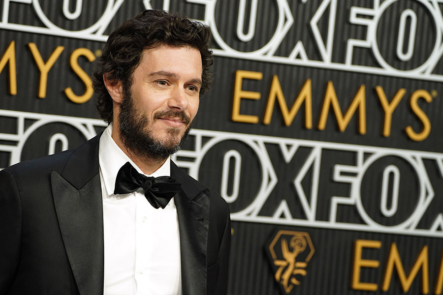 Adam Brody on the red carpet at the 75th Emmy Awards