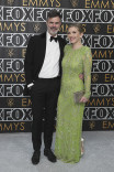 Graham Larson and Rhea Seehorn on the red carpet at the 75th Emmy Awards