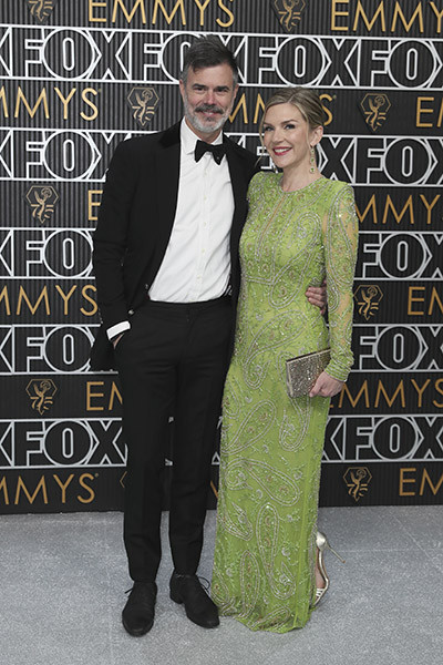 Graham Larson and Rhea Seehorn on the red carpet at the 75th Emmy Awards