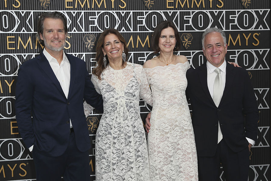 Chris Henrikson, Susannah Grant, Sarah Timberman, and Ed Redlich on the red carpet at the 75th Emmy Awards 