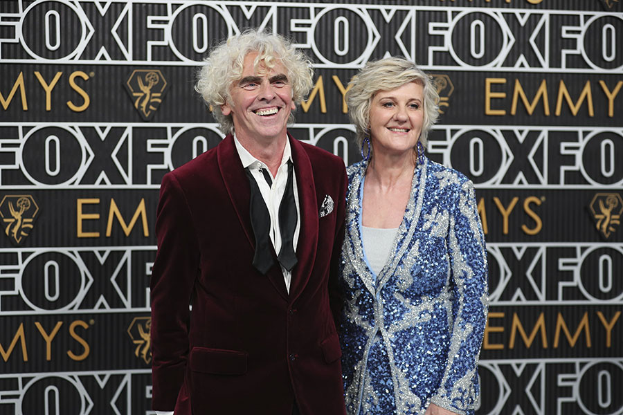 Declan Lowney from Ted Lasso and Jenny Barrett on the red carpet at the 75th Emmy Awards