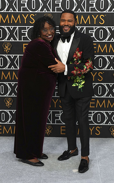 Doris Bowman and host Anthony Anderson on the red carpet at the 75th Emmy Awards