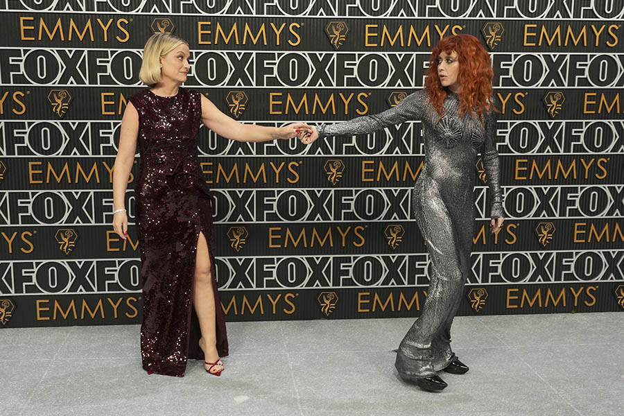 Amy Poehler and Natasha Lyonne on the red carpet at the 75th Emmy Awards