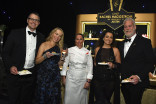 Chef Rachel Haagsban with a group of Television Academy Governors at the 75th Emmy Awards Governors Gala