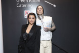 Kourtney Kardashian Barker and Travis Barker backstage at the 75th Emmy Awards 