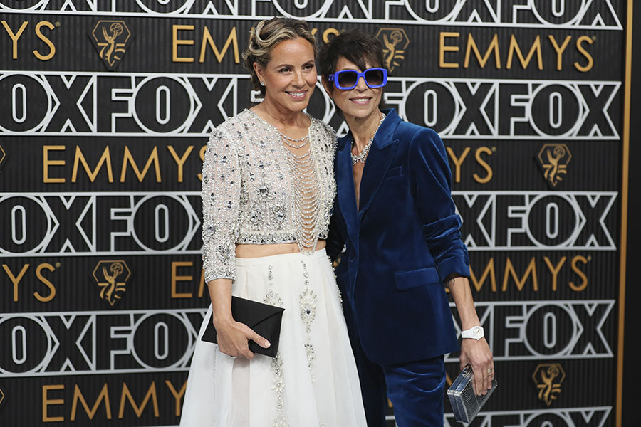Maria Bello from BEEF and Dominique Crenn on the red carpet at the 75th Emmy Awards 