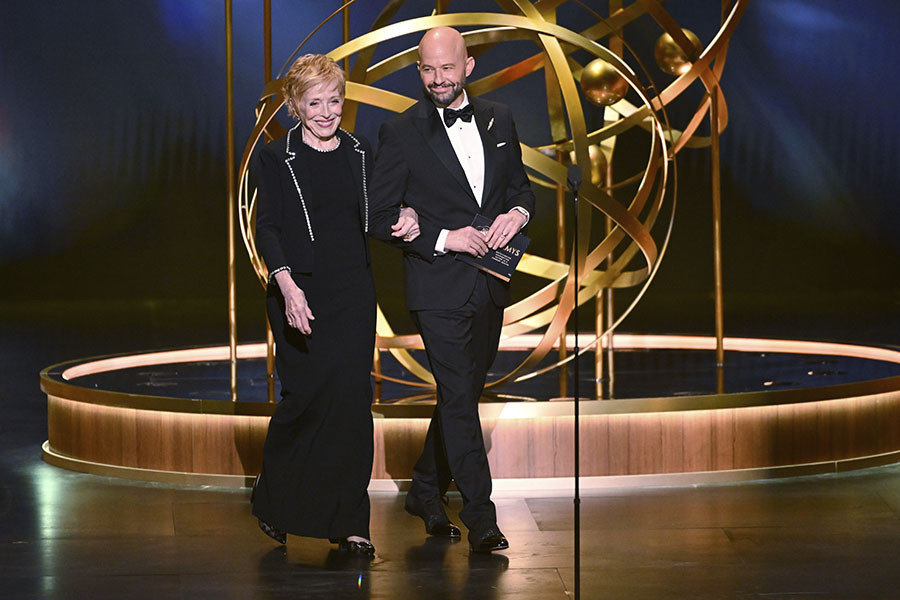 Two and a Half Men costars Jon Cryer and Holland Taylor presenting at the 75th Emmy Awards