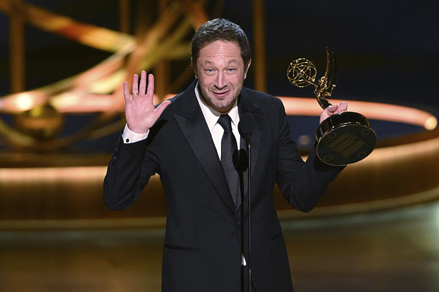 Ebon Moss-Bachrach from The Bear accepts an award for Outstanding Supporting Actor In A Comedy Series at the 75th Emmy Awards